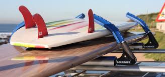 barre de toit pour planche de surf