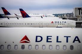 Passengers evacuated after Delta flight returns to Atlanta due to report of fumes in the flight deck, airline says