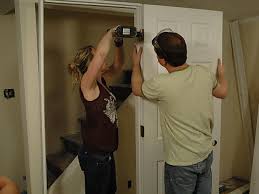 If you hang doors now shim it off the subfloor a hair, later as you tile you will undercut the jamb 1 side at a time as you tile just under it. How To Install A Pre Hung Door How Tos Diy