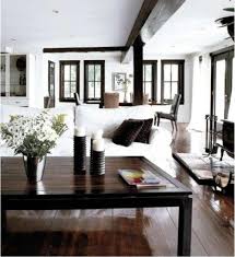 I Love White Walls Black Trim Hardwood Floors And Exposed Beams White Walls Living Room Dark Wood Floors Living Room Living Room Wood Floor