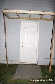 Planning on a painted front door? House Renovations Week 10 Building A Door Roof Or How Awesome Is My Daddy Southern Hospitality