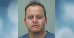 Resident adviser at private dorm faces sexual assault charge