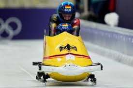Germany’s Johannes Lochner starts fast in Olympic 2-man bobsled race