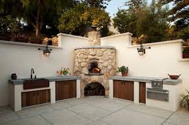 Outdoor Kitchen Designs Featuring Pizza Ovens Fireplaces And Other Cool Accessories Outdoor Kitchen Pizza Oven Outdoor Outdoor Kitchen Design