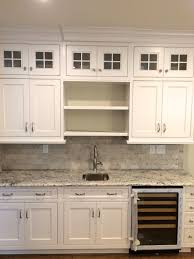 Ice White Granite Countertops With Dynasty Maple Pearl Cabinetry White Granite Countertops Kitchen Remodel Countertops Kitchen Backsplash Designs
