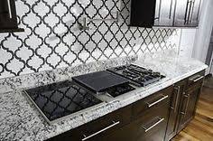 What's more, if you're using a subway tile that's beveled, you'll really see the dimensional feel at play which creates fluid movement for the eyes. 25 Black Grout Ideas Black Grout Kitchen Tiles Kitchen Design