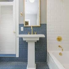 If you're looking to keep it simple, a metal rack like this one can be a great option. Kohler Tresham Pedestal Sink Design Ideas