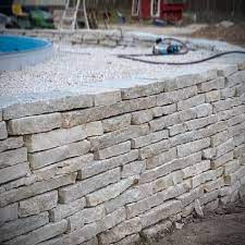Our manufacturing capabilities allow us to offer many custom alternatives. Backyard Landscaping Patio How To Build A Dry Stacked Stone Retaining Wall Buechel Stone