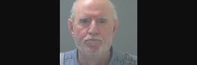 Milton man charged with trying to run over his neighbor with his car