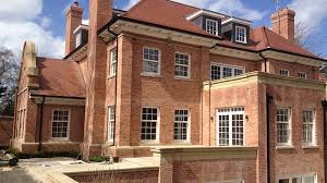 Exterior stone cladding, stone fascia and stone veneer. Yorkshire Stone Craft Ltd Halifax Stone Merchants Construction Co Uk