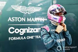 What does aston martin star sebastian vettel's new formula 1 helmet look like? Vettel Pride Not Important In Pink F1 Helmet Switch