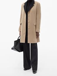 A vintage wool camel coat. Gabriela Hearst Bailey Single Breasted Recycled Cashmere Coat Womens Camel Editorialist