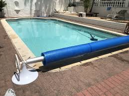 Diy pool cover using pvc and a tarp to keep the water and leaves out of the pool and to make spring opening easier! Swimming Pool Cover Rollers Roll Up Station For Pool Covers
