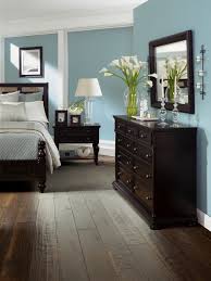 Keep the overall effect elegant and light by balancing the dark floors with white cabinetry and walls, warm bronze metals and wood accents just a few shades lighter than the floors. Dark Wood Floor Bedroom Ideas Bedrooms With Floors Atmosphere Tile Bathroom And Cream Inexpensiv E Vinyl Flooring Options Medium Rustic Living Room Apppie Org