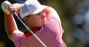 Defending Men's State Amateur champion Joey Moore tied for 1st after  opening round