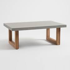 Be aware that wood will weather over time if it's left unsealed and that urban how large does a coffee table need to be? Faux Cement Palmera Outdoor Patio Coffee Table By World Market Modern Patio Furniture Outdoor Coffee Tables Outdoor Patio Table
