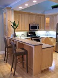 Natural Maple Shaker Cabinets With Grey Silestone Quartz Countertops Maple Kitchen Cabinets Kitchen Remodel Small Kitchen Renovation