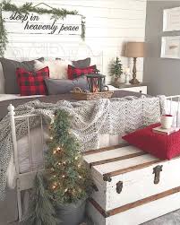 A cozy christmas bedroom with snowy evergreen wreaths over the bed, candle lanterns. Farmhouse Bedroom With Christmas Decor Seasonaldecor Homechanneltv Com Christmas Decorations Bedroom Christmas Room Christmas Room Decor