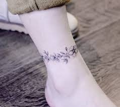 Wrap Around Floral Piece By Helen Helenxu Tattoo Thefineartfactory Teamgoldeniron Goldenironta Wrap Around Tattoo Wrap Around Ankle Tattoos Anklet Tattoos