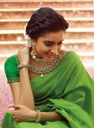 It is a perfect hairstyle for saree and you can make this hairdo for occasions like weddings, parties, etc. Style By Rachel S Stylesmith Chennai Weddingnet Wedding India Indian Indianwedding Wedding Simple Hairstyle For Saree Saree Hairstyles Indian Hairstyles
