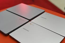 Cecil Calliste donates laptops to students at USC