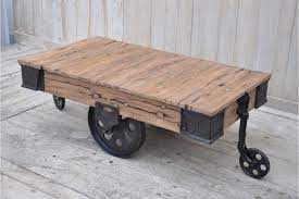 These rustic wheel coffee table are offered in various shapes and sizes ranging from trendy to classic ones. Industrial Cart Coffee Table Interiors Online