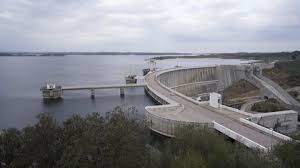 The surface of the alqueva lake is of about 250 km2 and 83 km in length, so you can sail from amieira to the juromenha village on this large body of water. Barragem Alqueva Stock Video Footage 4k And Hd Video Clips Shutterstock
