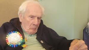 Former Spireites player Jim Lovie received his legacy badge