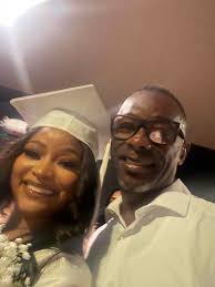 Me and my God Daughter at her graduation last summer.
