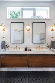 Modern bathrooms are vastly improved, though, as many older homes will not even have a light switch inside the room but how high to install an outlet above a bathroom vanity. How To Get Your Bathroom Vanity Lighting Right