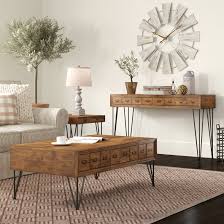 It includes a storage coffee table and an end table that are both crafted from solid and engineered wood. Laurel Foundry Modern Farmhouse Bayle 3 Piece Coffee Table Set Reviews Wayfair