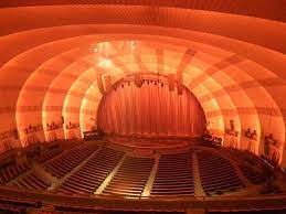 When it first opened in 1932, radio city music hall was intended to be a building that would transition a neighborhood from an area known for its speakeasies into an upscale place for entertainment. Ad Classics Radio City Music Hall Edward Durell Stone Donald Deskey Archdaily