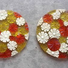 1879 during the edo period, there was an unprecedented growth of print publishing (in part due to the support of the tokugawa regime), and the creation and sale of printed buddhist works exploded. Vintage Flower Trivets By Edward Beyer Designs 1969 Collectors Weekly
