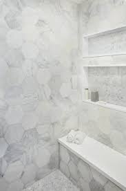Nero marquina offers a classic rich black marble with a distinctive white veining pattern suitable to both classic and modern inspired design projects. Marble Hex Tile Shower Niche Design Ideas