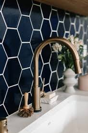 Kitchen backsplash is no more a protective element. Navy Tile Trend Alert