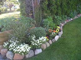 Love This Semi Raised Garden Border I Need To Do This Under The Pine Trees Landscaping With Rocks River Rock Garden Flower Bed Borders
