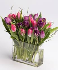 Tulip Courtship A Customer Favorite This Simple Yet Stunning Collection Of Pink And Purple Tulips Is Arranged In O Flower Delivery Flowers Flower Arrangements
