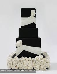 Black And White Bow Tie Cake Black Fondant Cake With White Bows And White Sugar Roses Bling Wedding Cakes Wedding Cake Pictures Bow Wedding Cakes