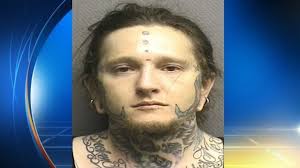 Man accused of possessing drugs, gun in front of his young son