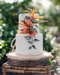 Tropical Themes Are The Perfect Summer Touch For Your Wedding Here Are 41 Ideas That Will Br Tropical Wedding Cake Tropical Wedding Wedding Cakes With Flowers