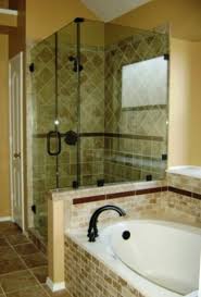 Cole & son frontier great wave wallpaper covers the upper walls over a surf themed kids' bathroom fitted with brass towel holders fixed to white glazed wall tiles. 38 Half Wall Shower For Your Small Bathroom Design Ideas Matchness Com