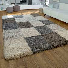 Auch andere aussergewöhnliche formen werden in dieser rubrik angeboten. Moderner Hochflor Teppich Hochwertig Kuschelig Weicher Shaggy Kariert Grau Beige Kaufen Bei Diva Teppich Center