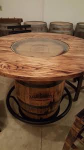 Unexpectedly, barrels can be elegant and offer a unique touch of class with flower additions, repurposed as planters and even up cycled into tables. Jack Daniels Whiskey Barrel Table With 4 Stave Chairs And Etsy Whiskey Barrel Table Barrel Table Barrel Decor