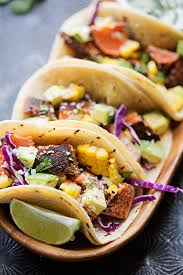 Fried in strips and served onboard warm corn tortillas with a simple salsa, a pinch of fresh cabbage, plenty of lime and a cream sauce you might want to punch up with some chopped chipotle, these fish tacos can turn a cold night. Blackened Salmon Tacos With Jalapeno Lime Crema Little Spice Jar
