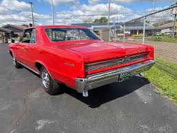 Image result for Grenadier Red 1964 GTO