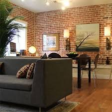 Red brick lined with white sets off a chrome lighting centrepiece and stark tiled floors. Pin On Home Decor