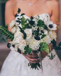 Flower could beautify the wedding and make it livelier. Black White Bridal Bouquet Wild Greens Anemones Scabiosa Dahlia Carnations White Wedding Flowers Carnation Wedding Bouquet White Carnation Bouquet