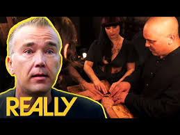 Conducting a Séance In Salem's Most Haunted Tattoo Parlour