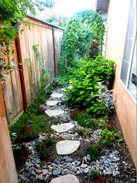 Narrow Side Yard Stepping Stones And Decorative Drainage Side Yard Landscaping Small Backyard Landscaping Cottage Garden Design