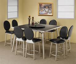 Charlestown 9 piece counter height solid wood dining set alcott hill finish: Black Glass Top 9 Piece Counter Height Dining Set In Silver Metal Finish By Coaster 120248